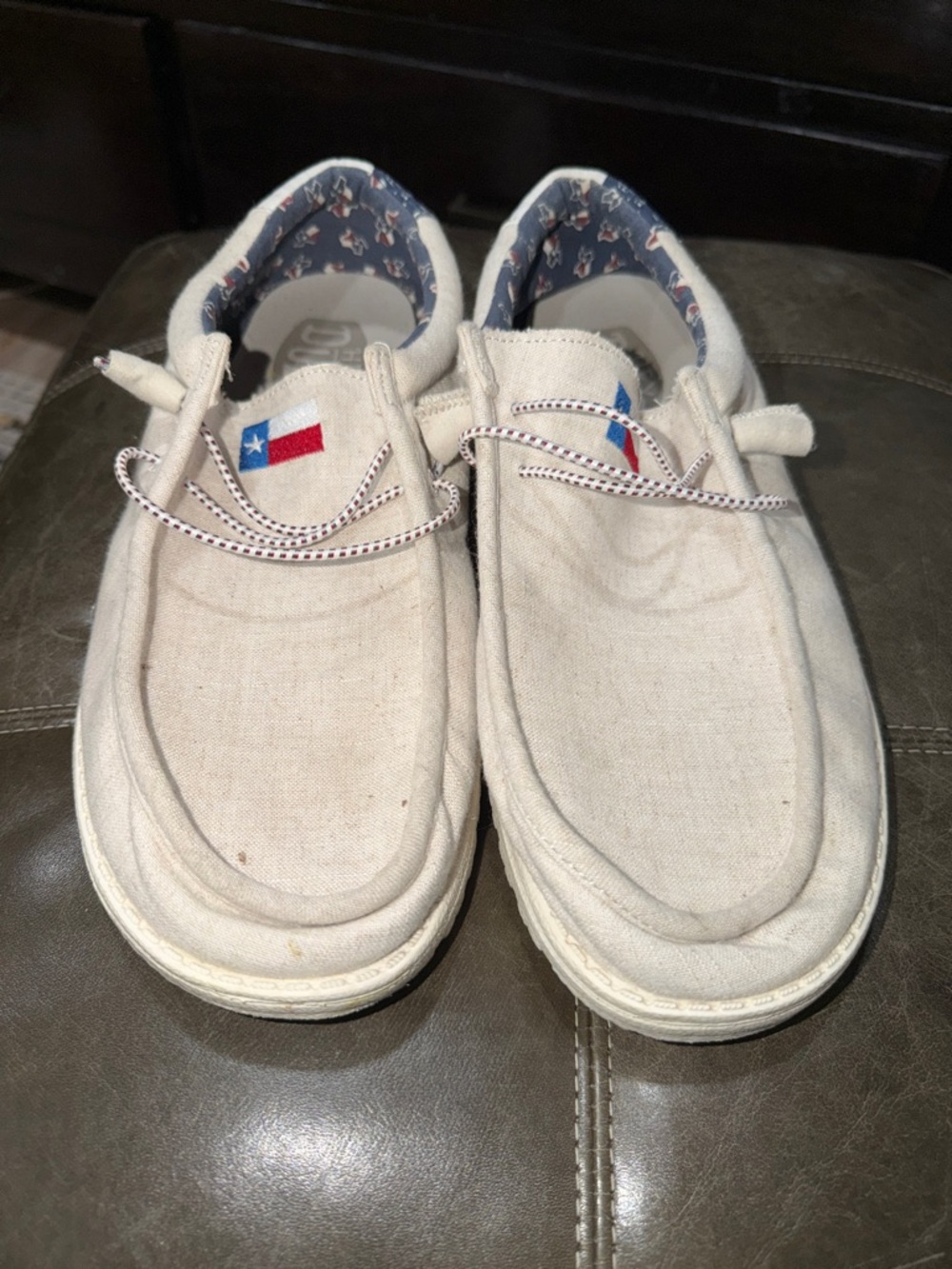 Unique Hey Dude Men's Natural Canvas Slip-Ons with Texas logos